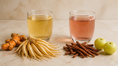 Turmeric and shatavari root beside a golden glass of water and manjistha root with amla beside a rose-tinted glass, comparing Acne Relief Drops and Brightening Drops