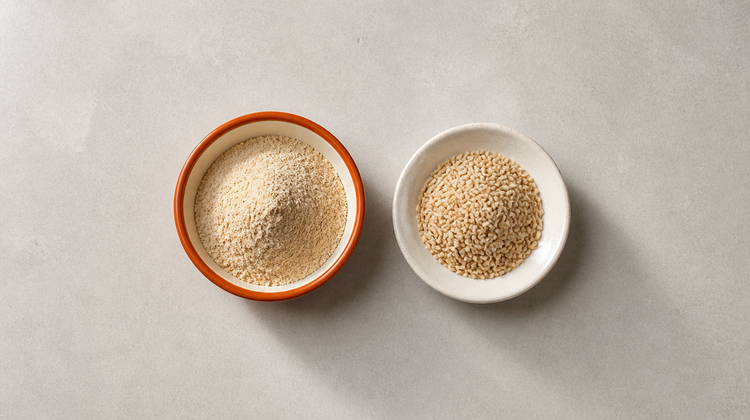 Burnt-orange bowl of rice bran powder beside a dish of brown rice grains, natural sources of phytic acid