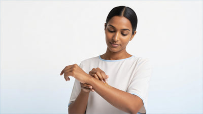 Indian woman patch testing skincare product on inner arm for sensitive skin