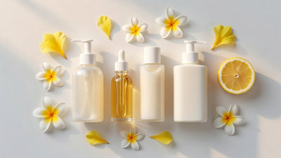 Summer skincare routine flat lay with face wash serum moisturiser and sunscreen on white surface