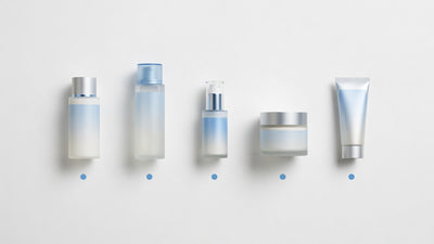 Five morning skincare products arranged left to right in application sequence on white surface