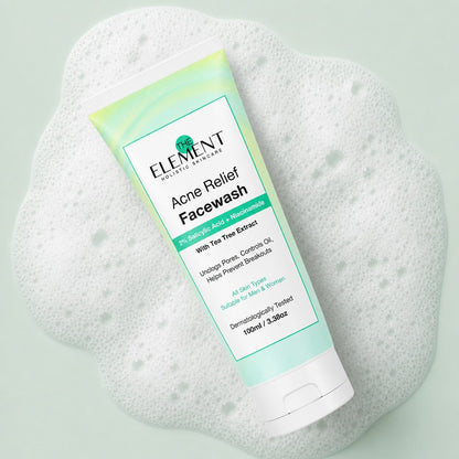 Acne Relief Face Wash tube on a bed of gentle cleansing foam
